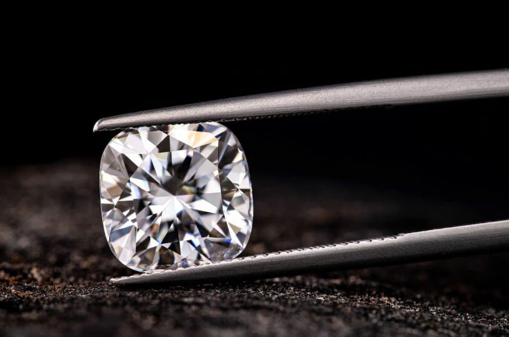 A closeup of a cushion cut diamond